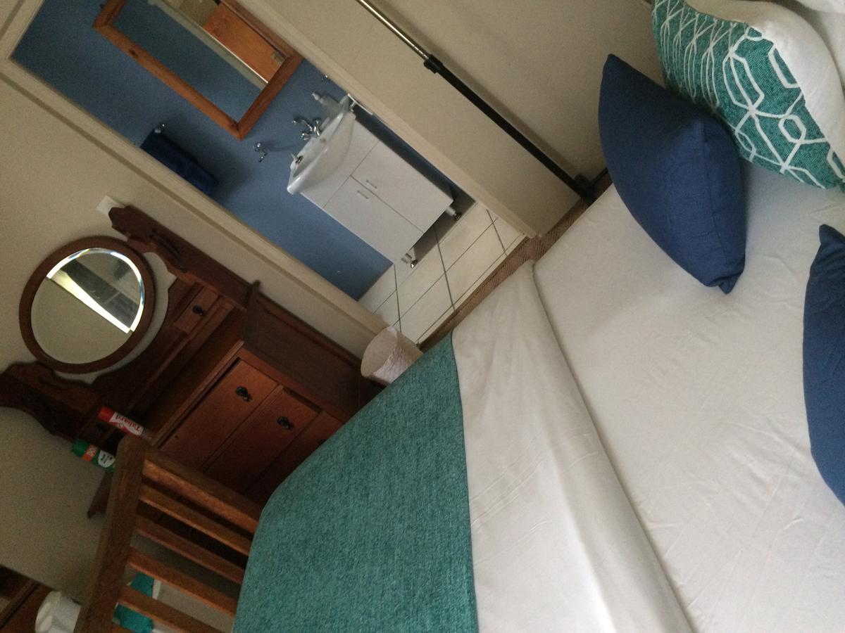 Breeze Inn Guesthouse Kiddʼs Beach Værelse billede